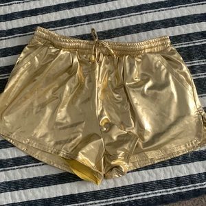 Size Small Gold Exercise Shorts. Great for a costume or Rave.